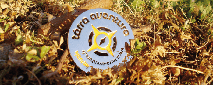 Médaille métallique gravée avec la mention Tèrra Aventura